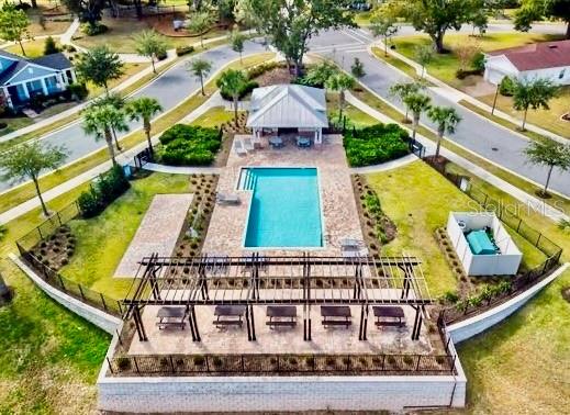 2208 Gopher Tortoise Terrace Oakland, FL 34787 - Photo 50 of 50 front view of a house with a swimming pool