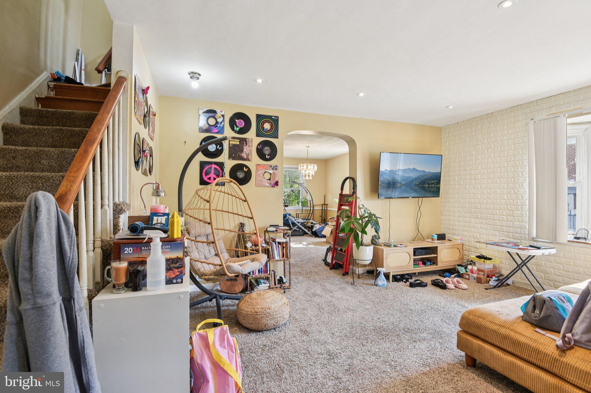 601 Braeside Road Baltimore, MD 21229 - Photo 4 of 24 Eclectic living space with vibrant decor.