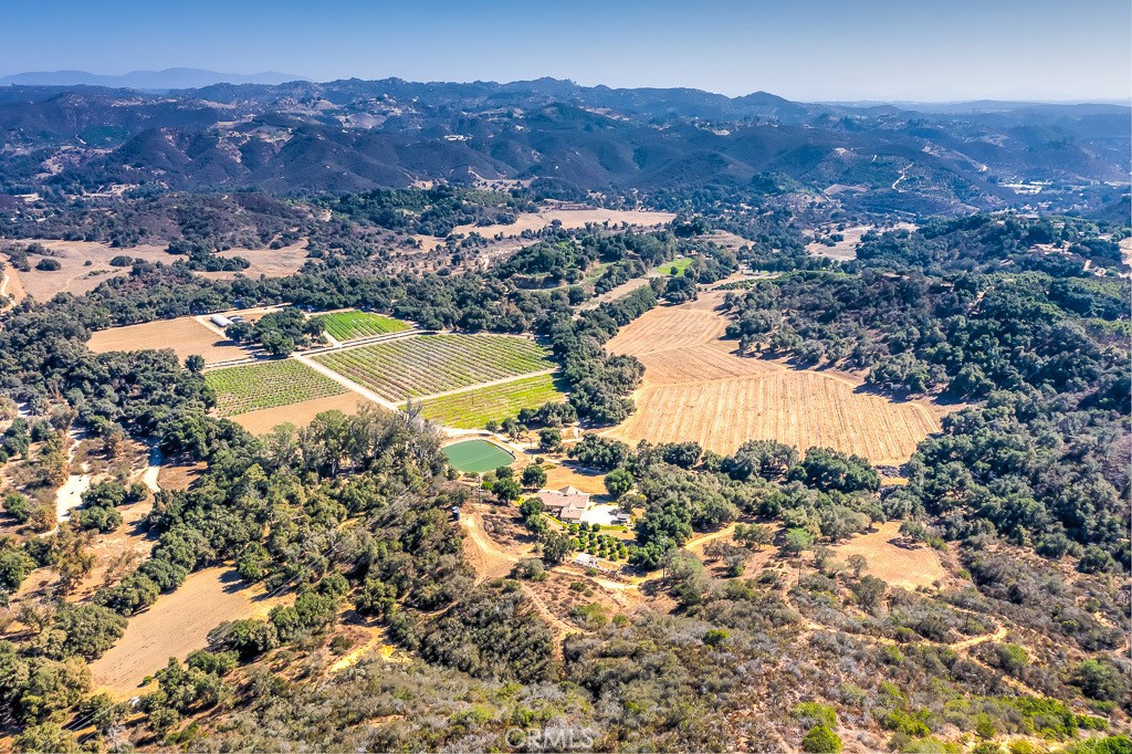 an aerial view of mountain with residential space and mountain view