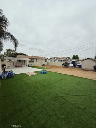 a view of a house with a big yard