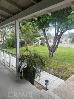 a view of backyard with green space