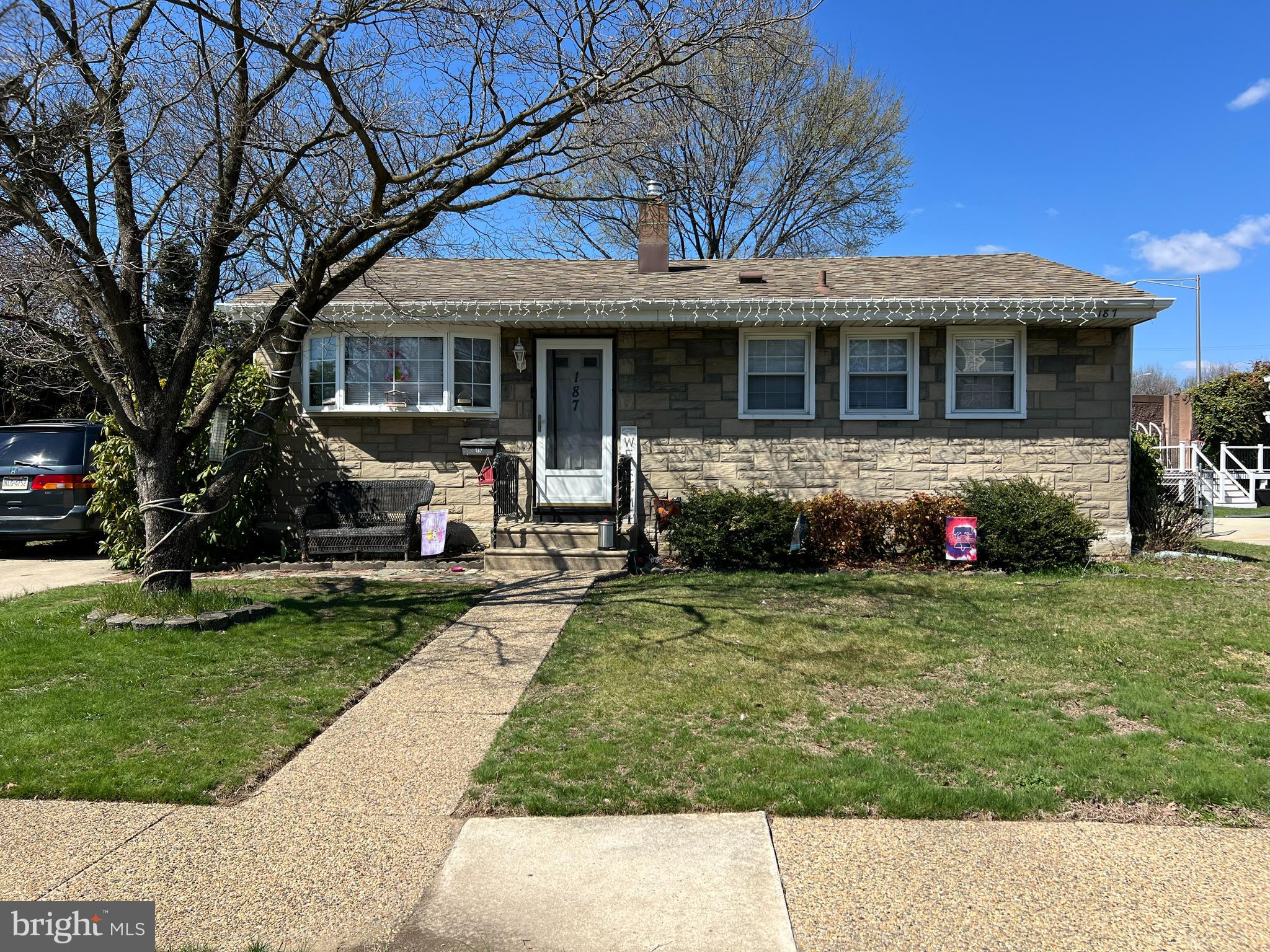 187 Gehrig Avenue Gloucester City, NJ 08030 - Photo 1 of 7 a front view of a house with a yard and garage