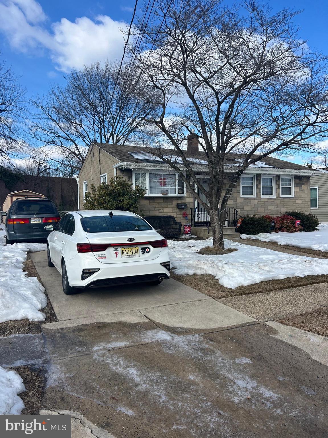 187 Gehrig Avenue Gloucester City, NJ 08030 - Photo 4 of 7 a car parked in front of white houses