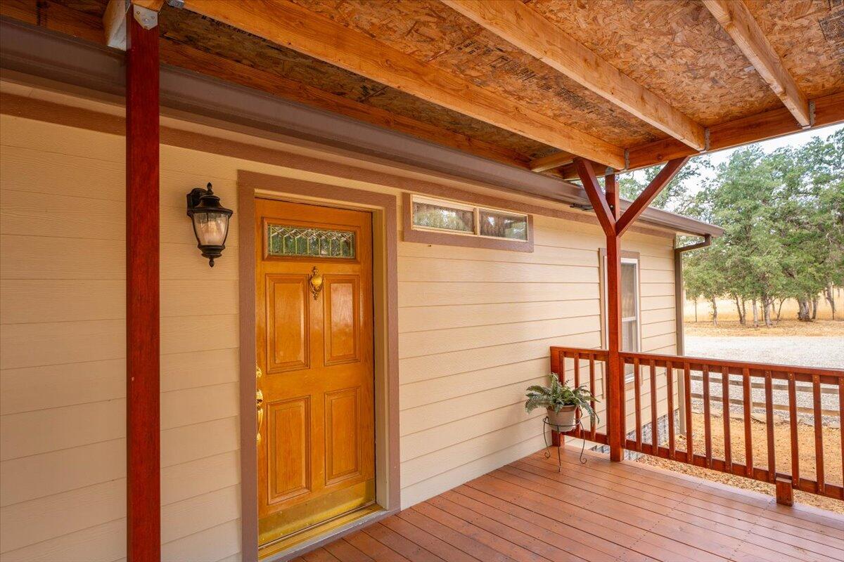 12560 Moon Shadow Ranch Road Red Bluff, CA 96080 - Photo 54 of 67 a view of a door and wooden floor