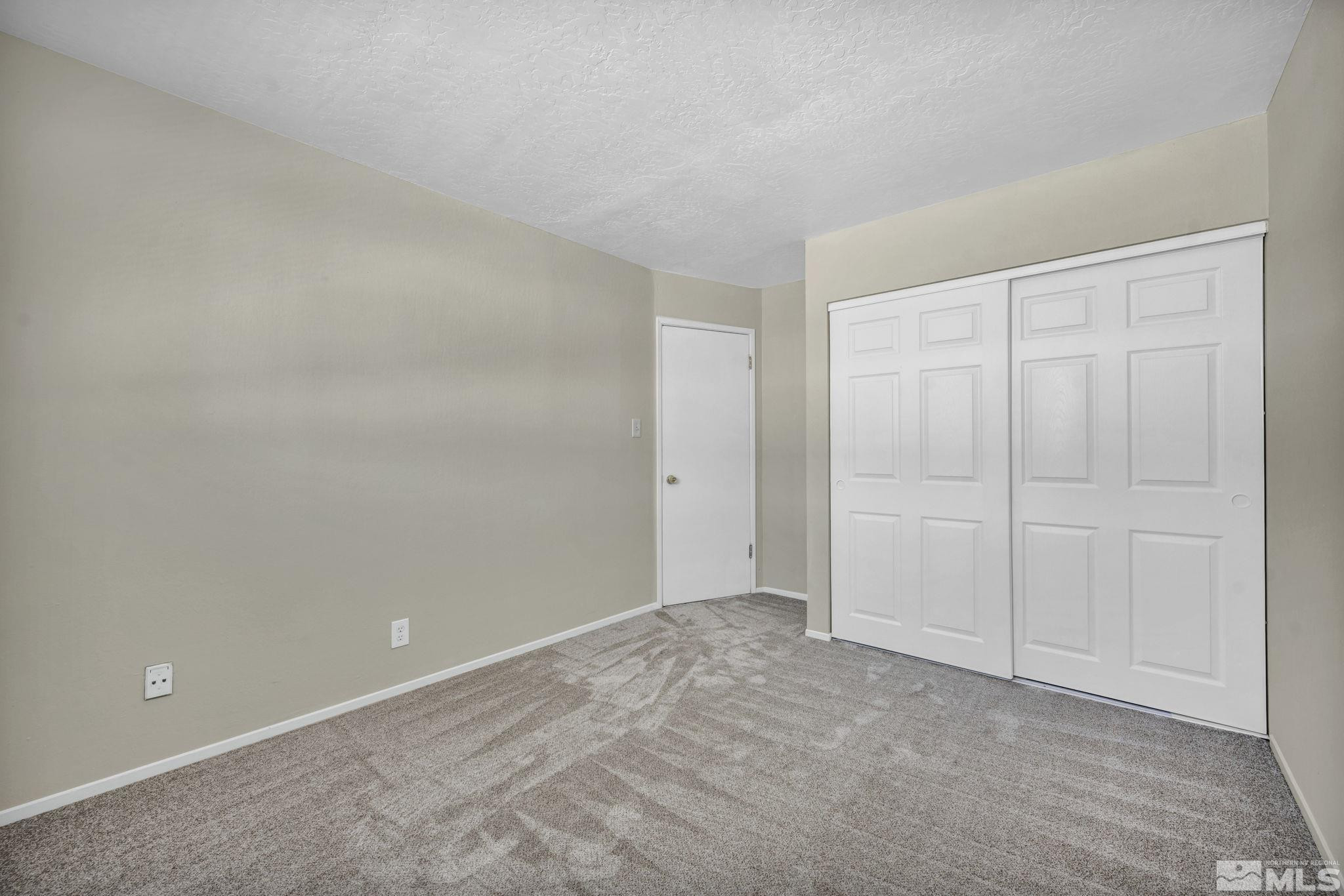 435 Pine Meadows Drive, Unit 33 Sparks, NV 89431 - Photo 14 of 17 a view of an empty room