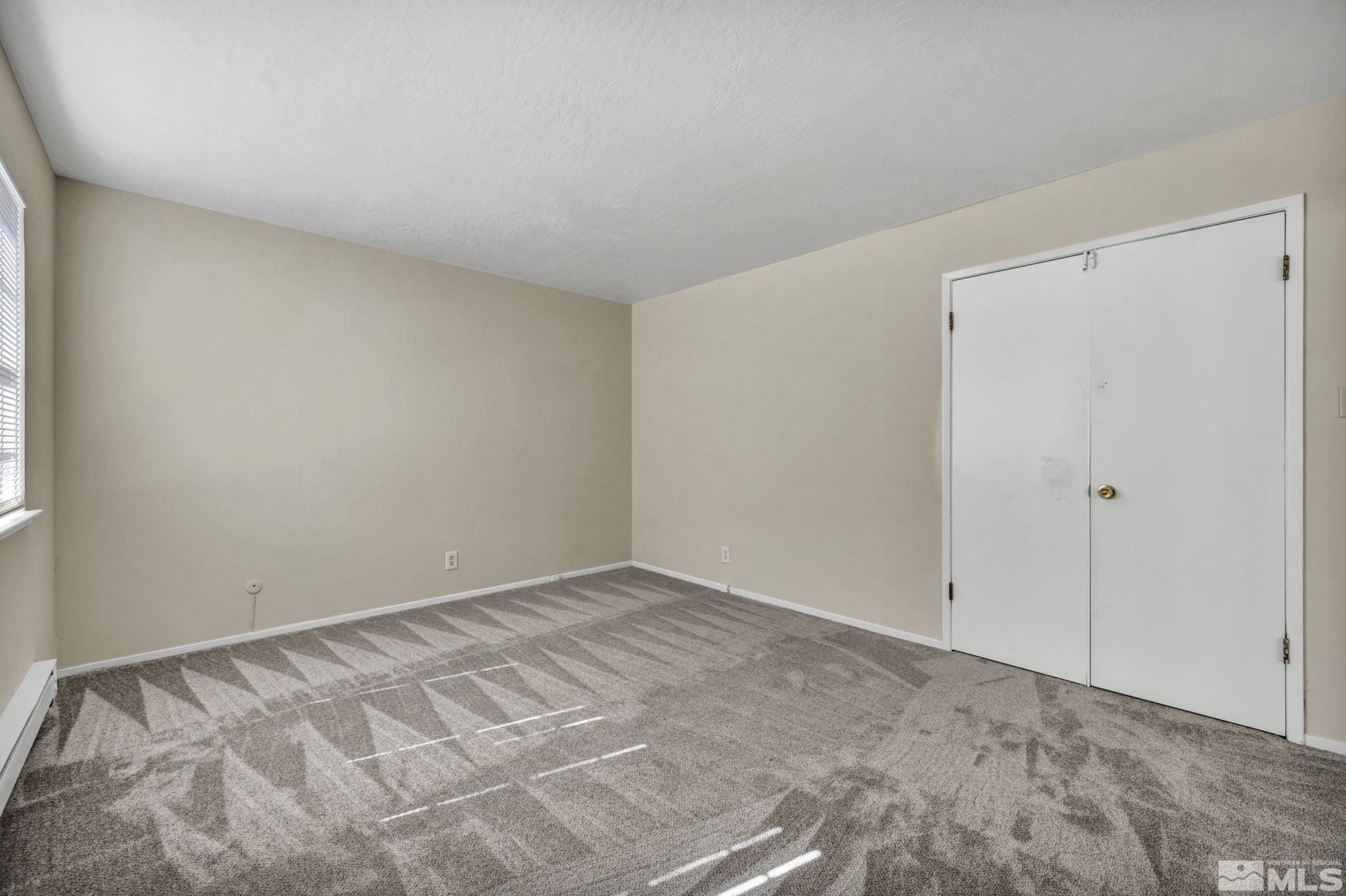 435 Pine Meadows Drive, Unit 33 Sparks, NV 89431 - Photo 9 of 17 a view of an empty room