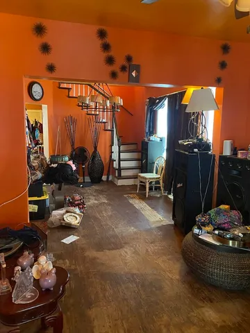 a kitchen with a table and chairs in it