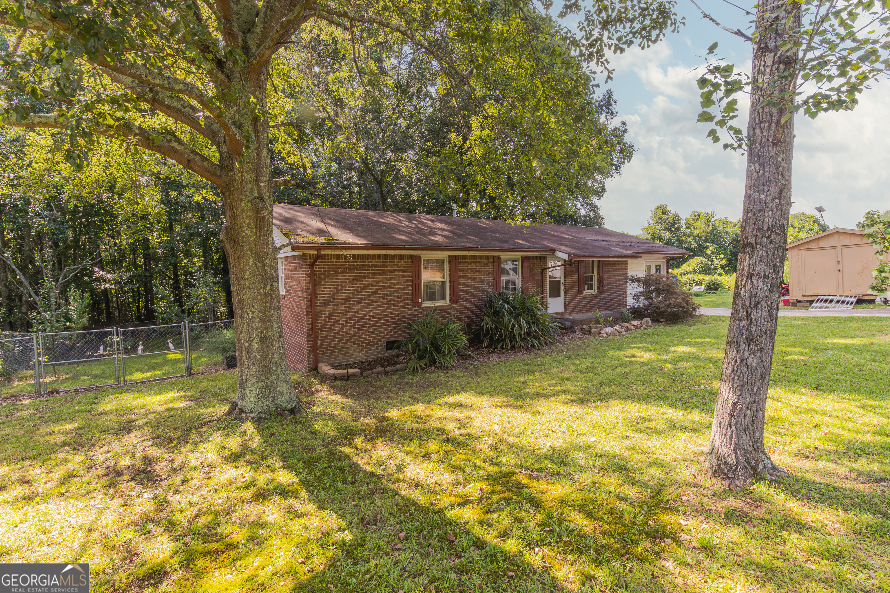 168 Sam House Road Bremen, GA 30110 - Photo 1 of 1 a view of a house with swimming pool