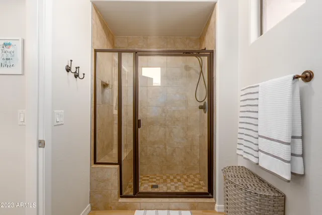 a livingroom with workspace and a window