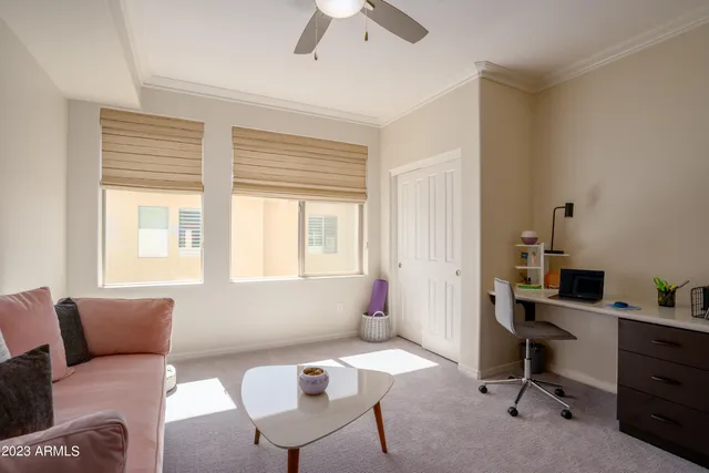 a street sign that is on a brick wall