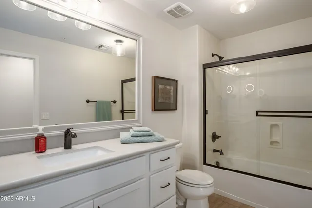 a view of street with a building in the background