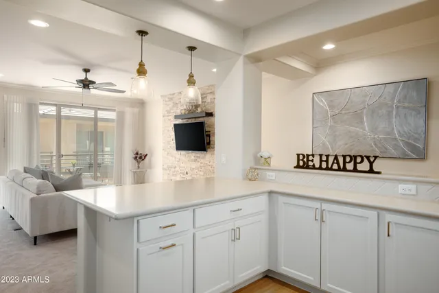 a view of a balcony with chairs