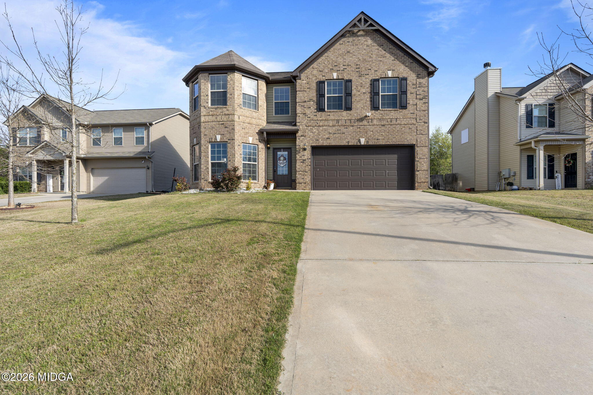 184 Amelia Drive, Unit 162 Byron, GA 31008 - Photo 1 of 46 a front view of a house with a yard