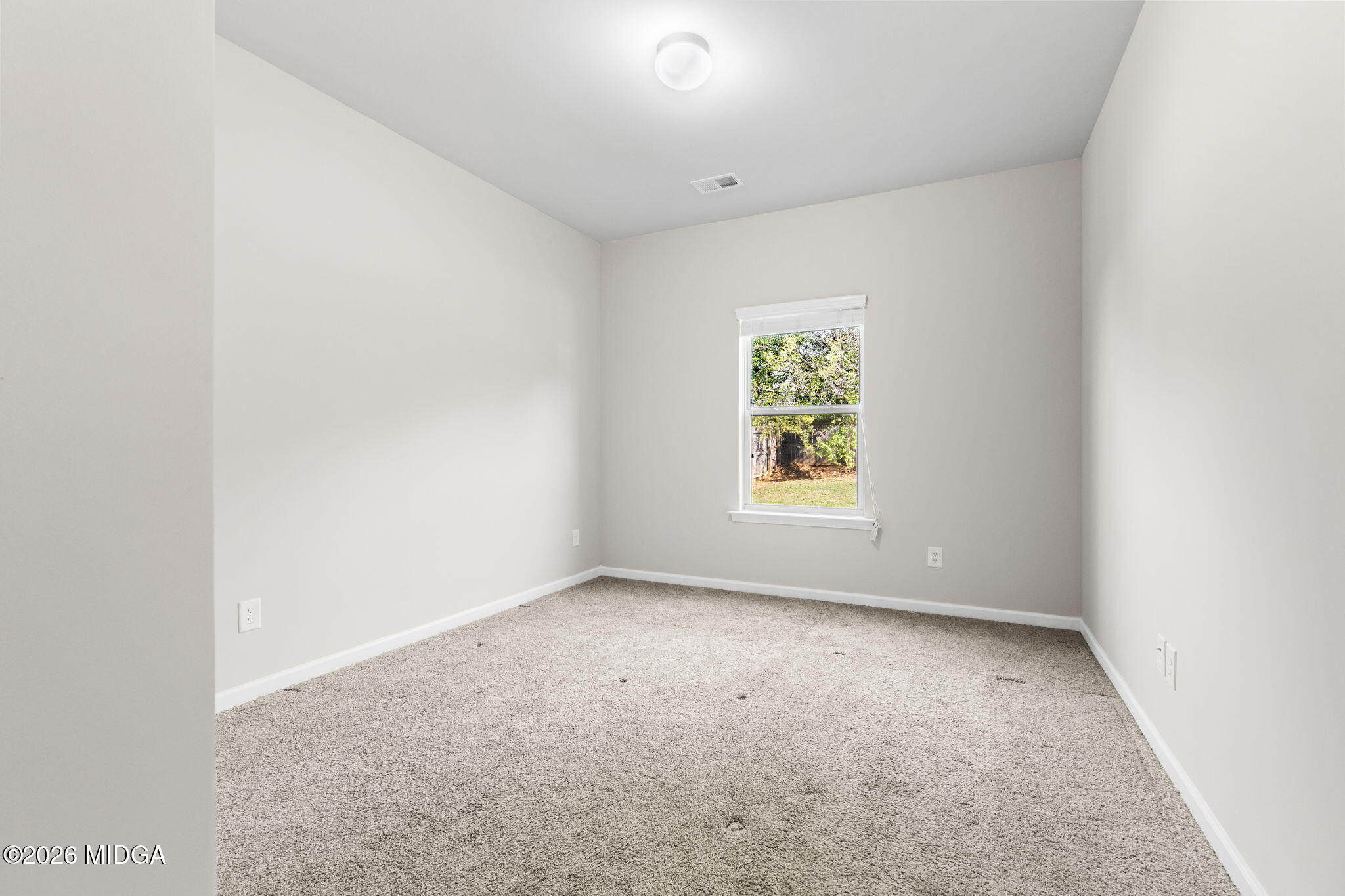 184 Amelia Drive, Unit 162 Byron, GA 31008 - Photo 20 of 46 an empty room with windows