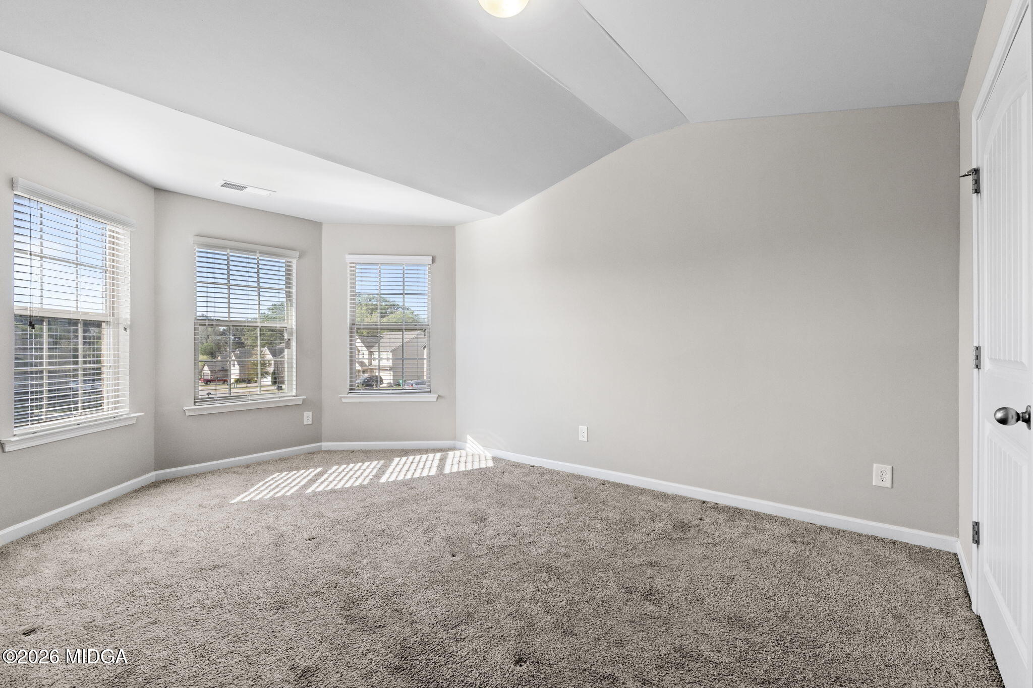 184 Amelia Drive, Unit 162 Byron, GA 31008 - Photo 27 of 46 an empty room with windows