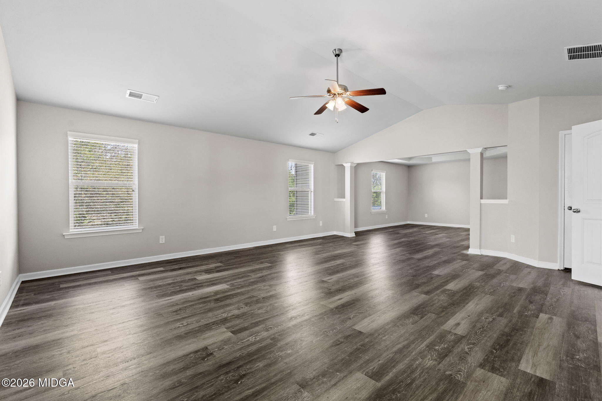 184 Amelia Drive, Unit 162 Byron, GA 31008 - Photo 31 of 46 a view of empty room with wooden floor and fan