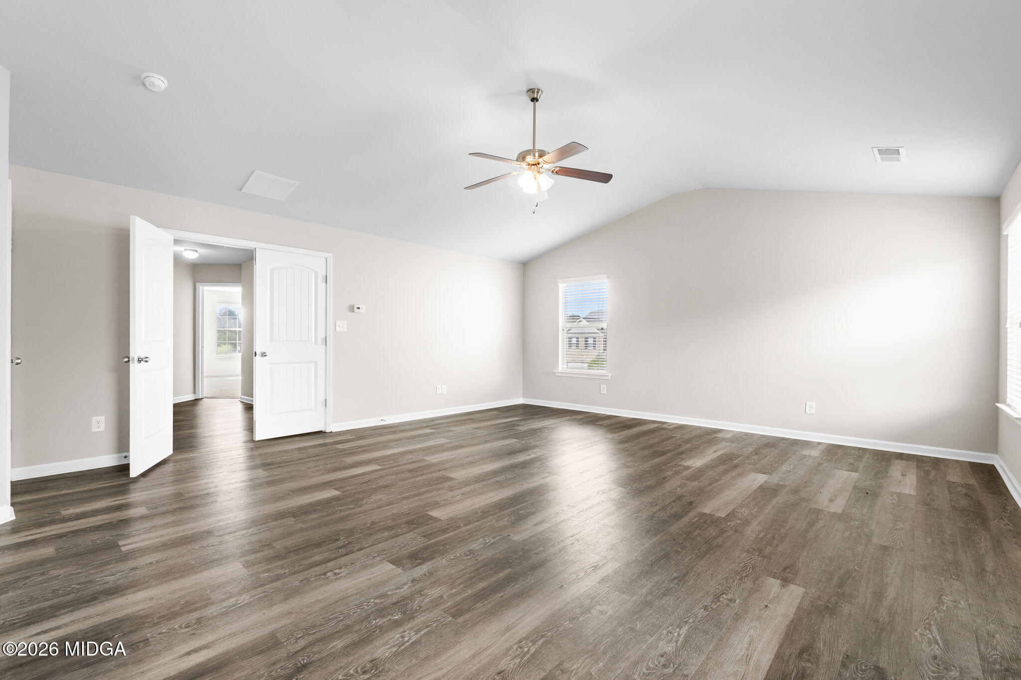 184 Amelia Drive, Unit 162 Byron, GA 31008 - Photo 33 of 46 a view of an empty room with window and wooden floor