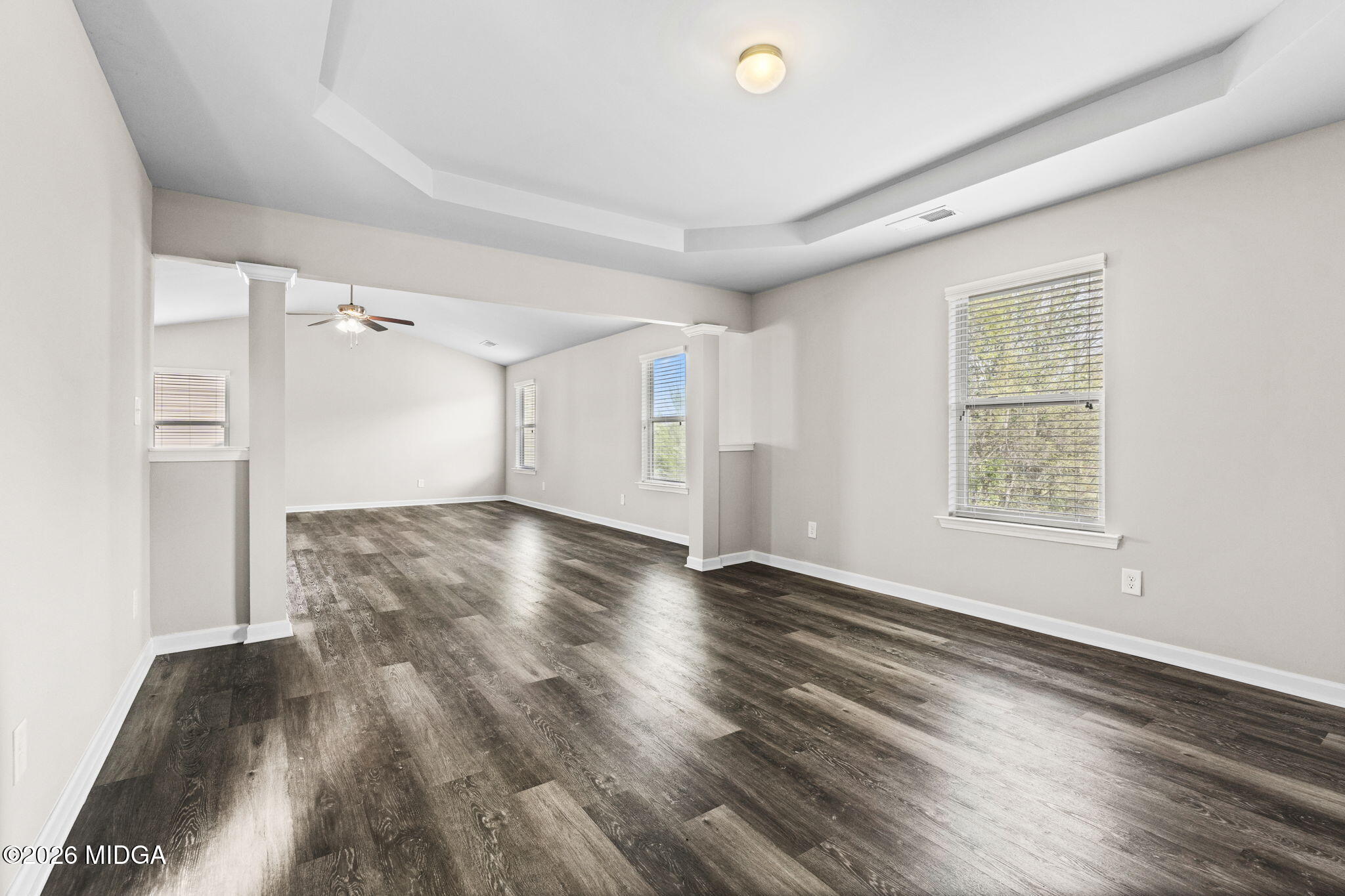 184 Amelia Drive, Unit 162 Byron, GA 31008 - Photo 35 of 46 wooden floor in an empty room with a window