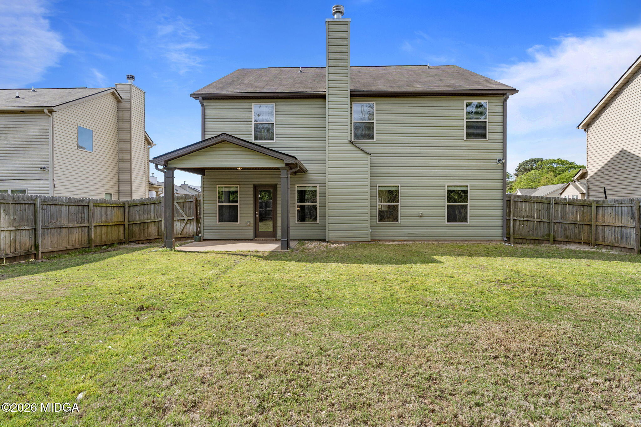 184 Amelia Drive, Unit 162 Byron, GA 31008 - Photo 45 of 46 a view of a house with backyard and porch