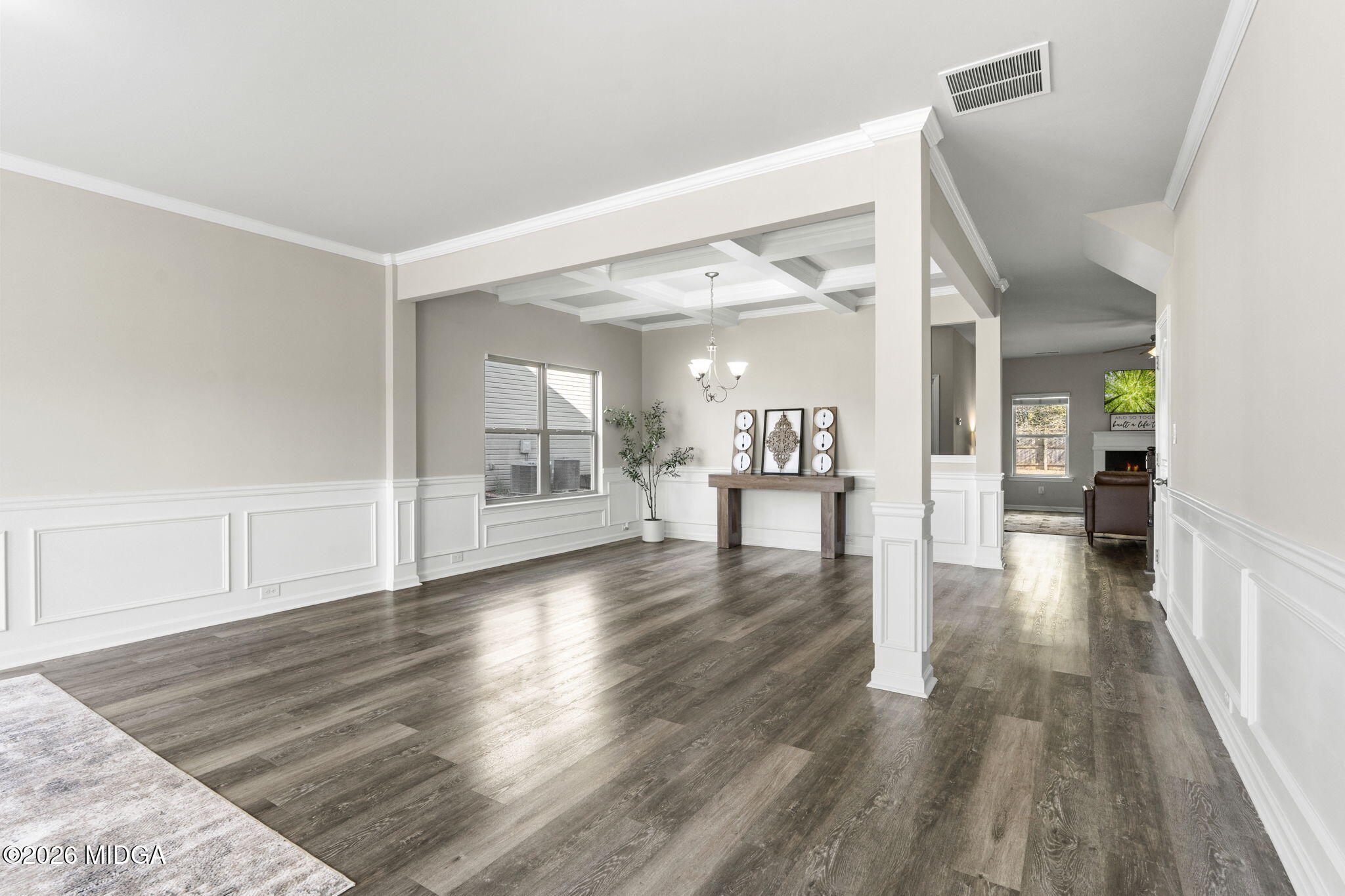 184 Amelia Drive, Unit 162 Byron, GA 31008 - Photo 9 of 46 a view of a hallway view with wooden floor and a living room