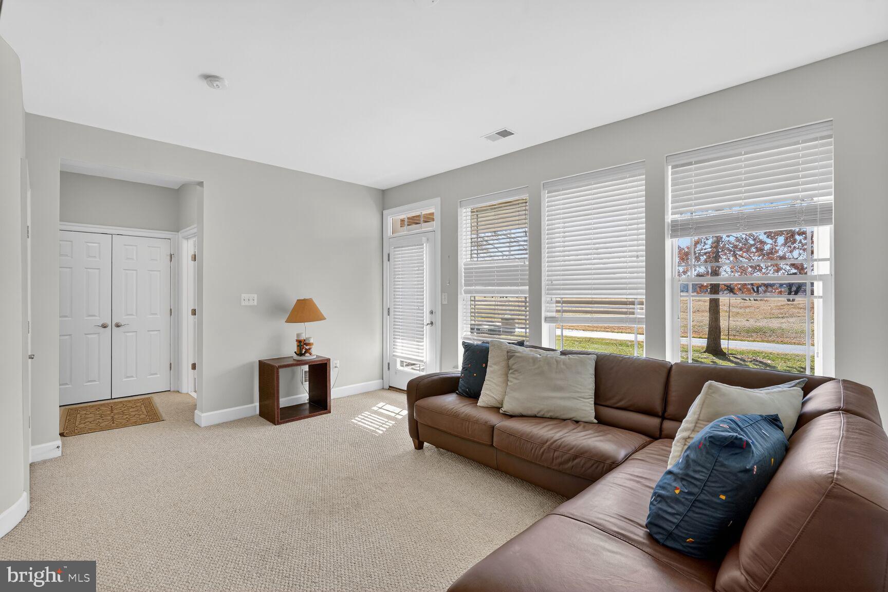 2804 Persimmon Place, Unit D3 Cambridge, MD 21613 - Photo 19 of 29 Lower level bedroom with en suite