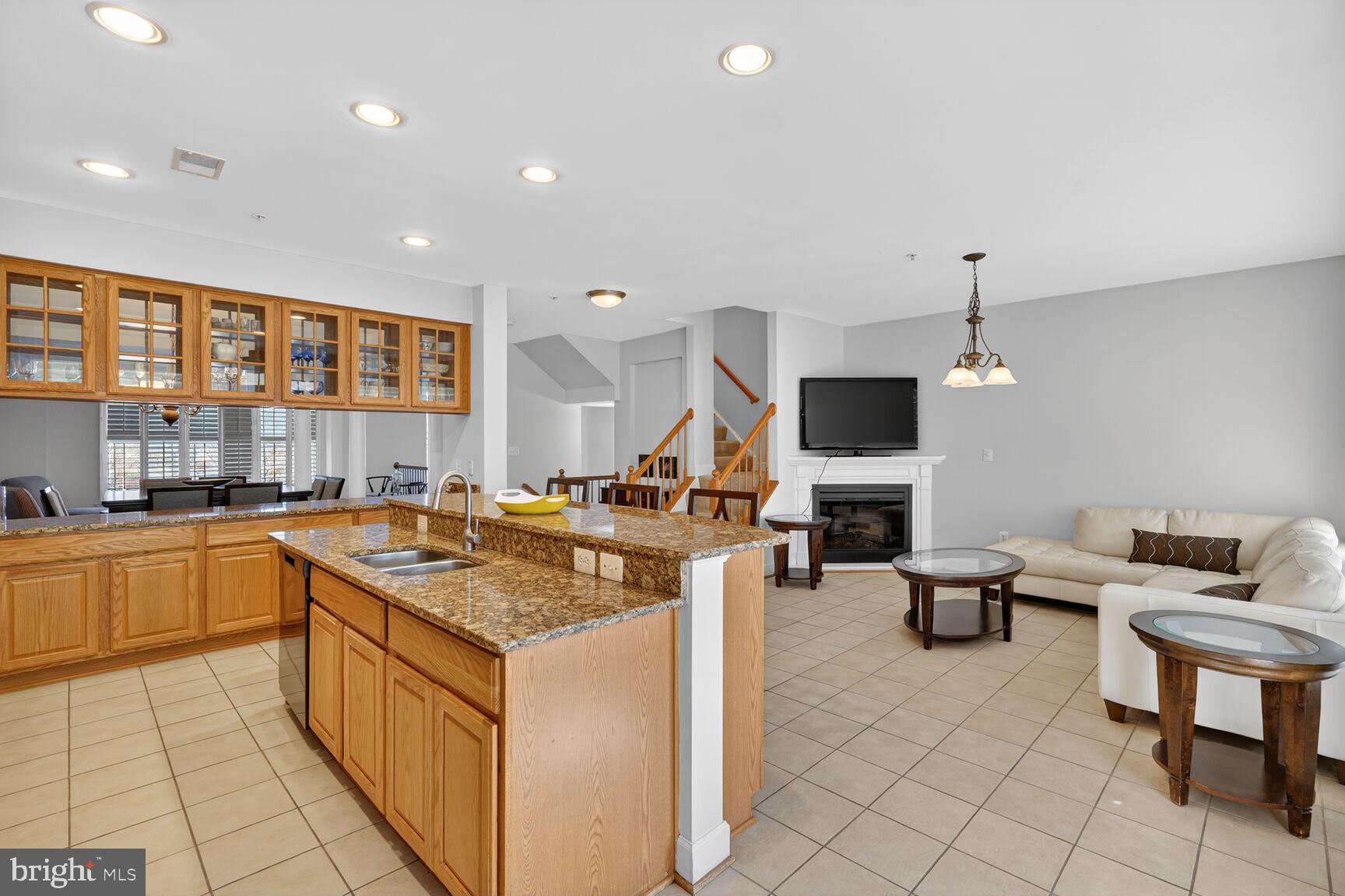 2804 Persimmon Place, Unit D3 Cambridge, MD 21613 - Photo 8 of 29 Den with fireplace for cozy living