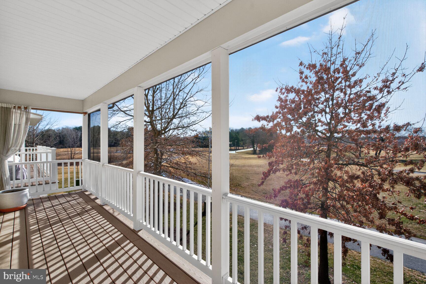 2804 Persimmon Place, Unit D3 Cambridge, MD 21613 - Photo 9 of 29 Screened balcony with golf views