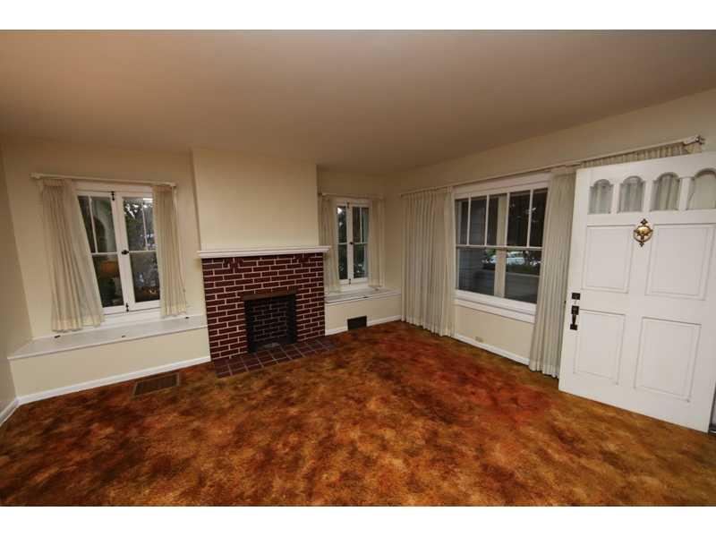106 West Ingomar Road Pittsburgh, PA 15237 - Photo 8 of 21 Living Room. The house has lots of windows and storm windows.