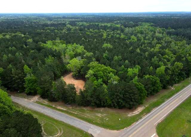 County Road County Road Cleveland, TX 77327 - Photo 5 of 19 a view of a lake with a yard