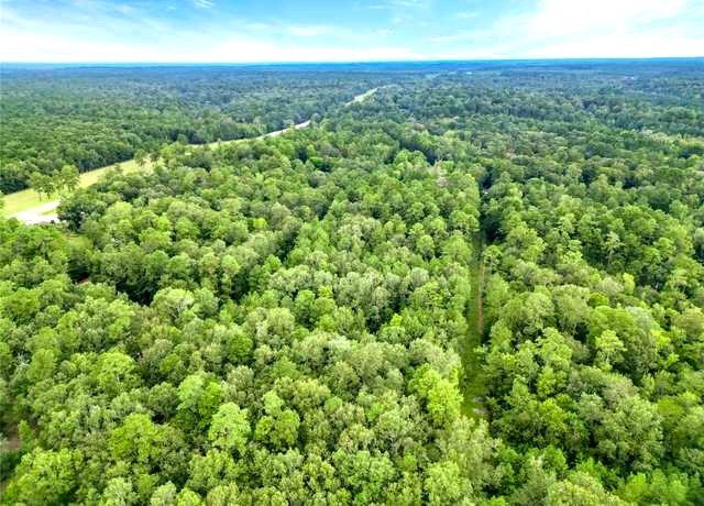 County Road County Road Cleveland, TX 77327 - Photo 10 of 19 an aerial view of residential houses with outdoor and green space