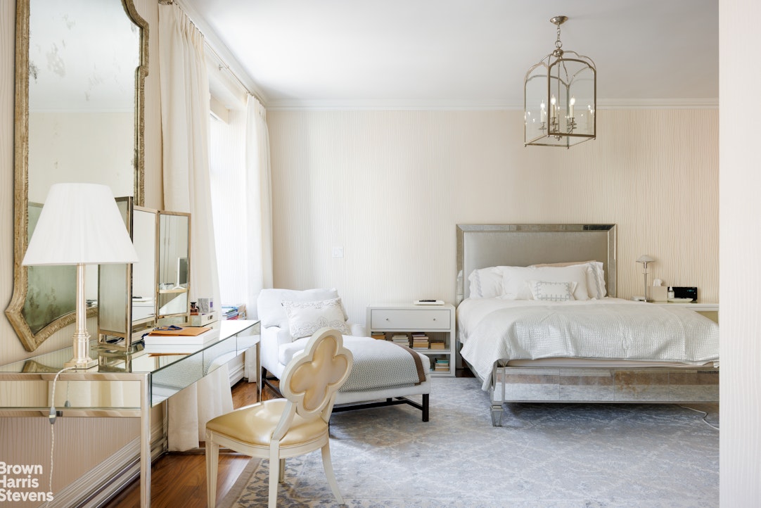 535 West End Avenue, Unit 8B Manhattan, NY 10024 - Photo 11 of 16 a bedroom with a bed a couch and dresser