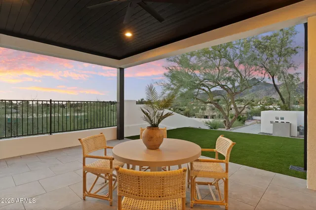 a kitchen with granite countertop a sink and cabinets