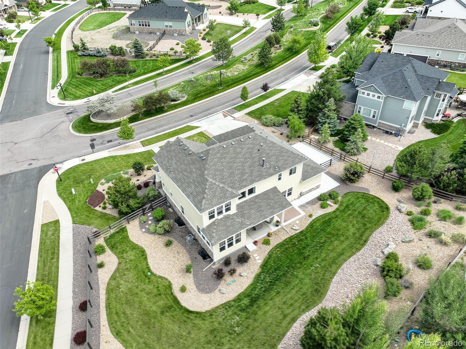 23451 East Rockinghorse Parkway Aurora, CO 80016 - Photo 3 of 36 an aerial view of a house having outdoor space