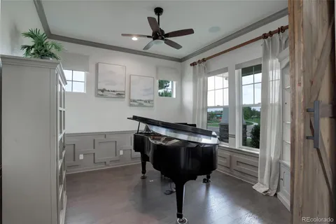 a room with table and chairs