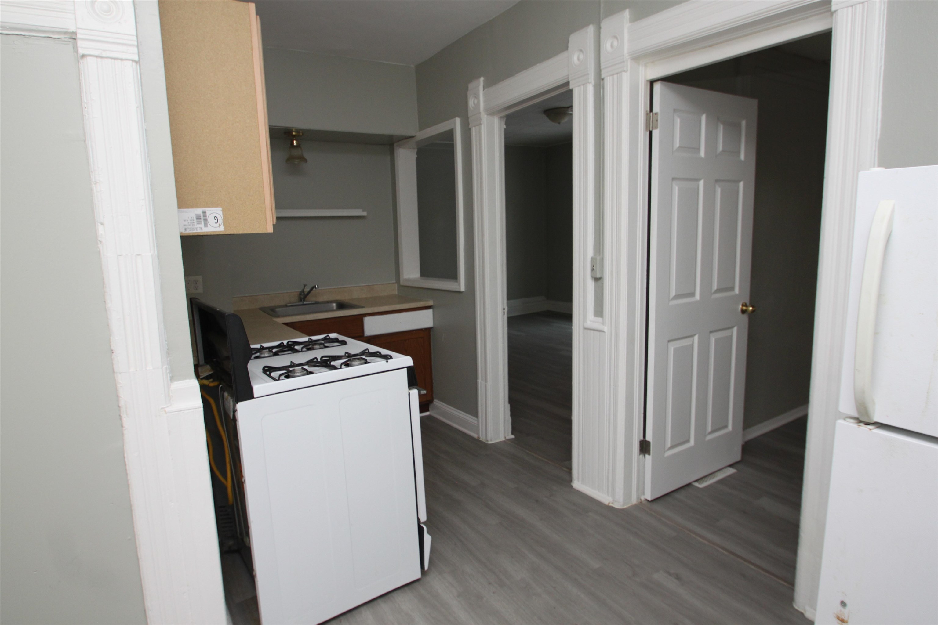 328 South Prospect Street Rockford, IL 61104 - Photo 10 of 14 a kitchen with a stove and a refrigerator