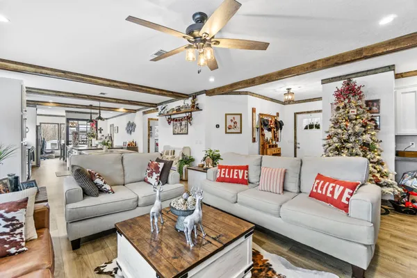 a bed room with a bed and a large window