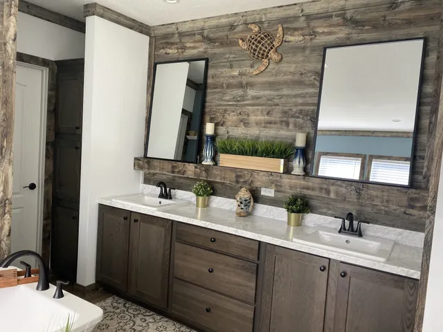 a bathroom with a double vanity sink and a mirror