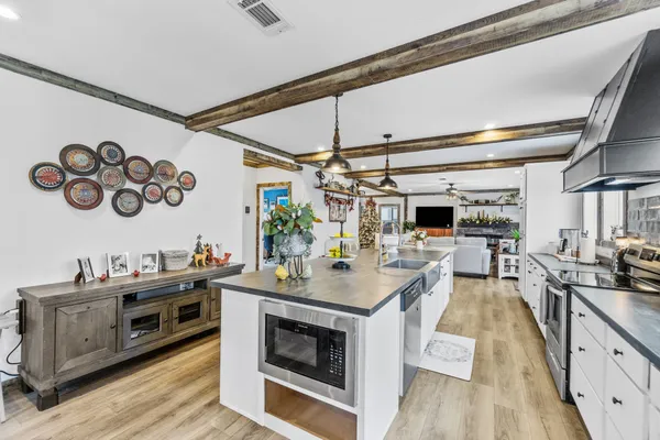 a work room with furniture and windows