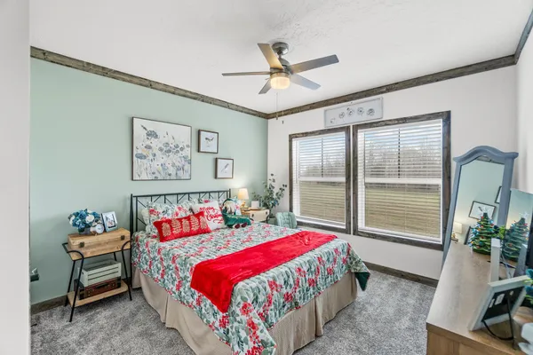 a view of a house with backyard and garden