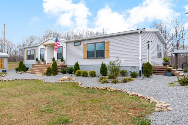 a house view with a outdoor space