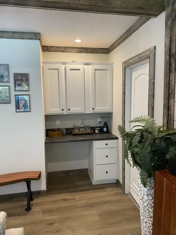 a room with view of wooden floor and staircase
