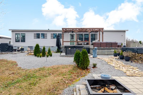 a view of backyard with seating space