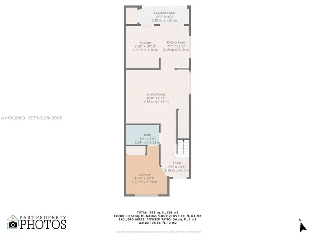 a picture of a bench in front of a wall