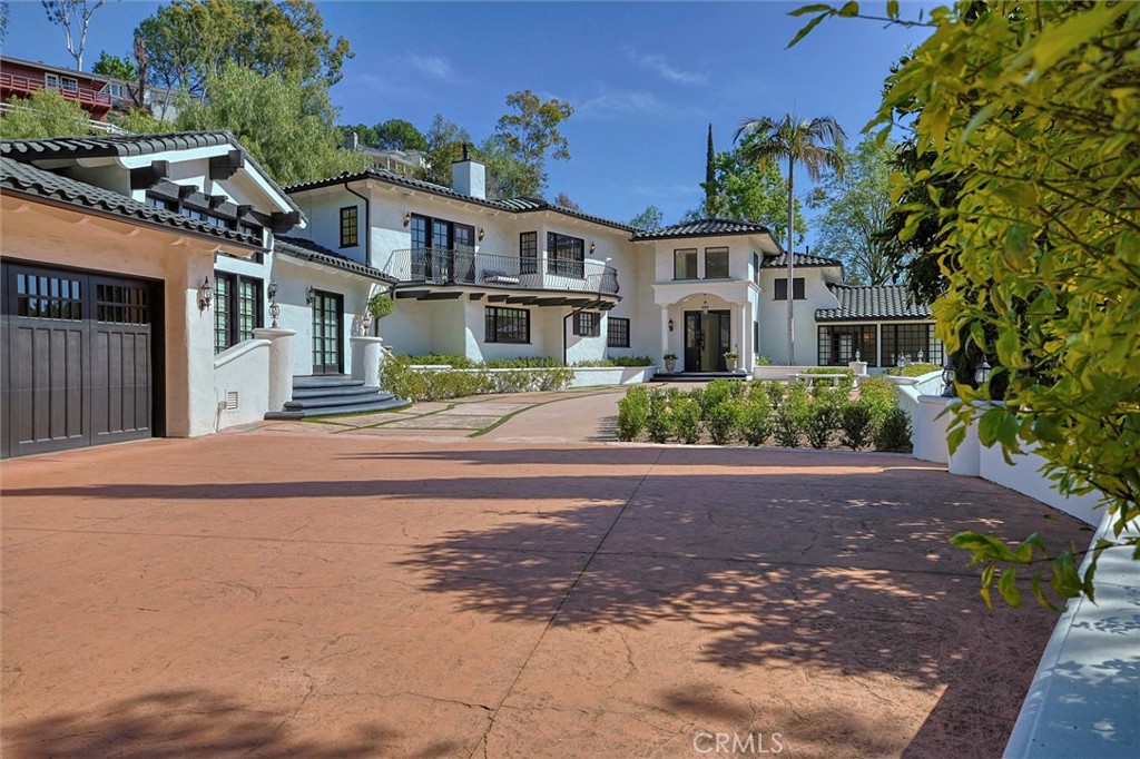 front view of a house with a street