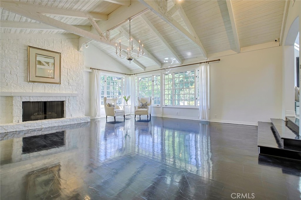 5839 Jed Smith Road Hidden Hills, CA 91302 - Photo 12 of 46 a living room with furniture and a fireplace