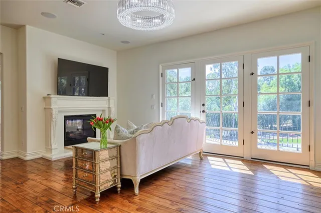 a bathroom with a granite countertop sink mirror and a bathtub