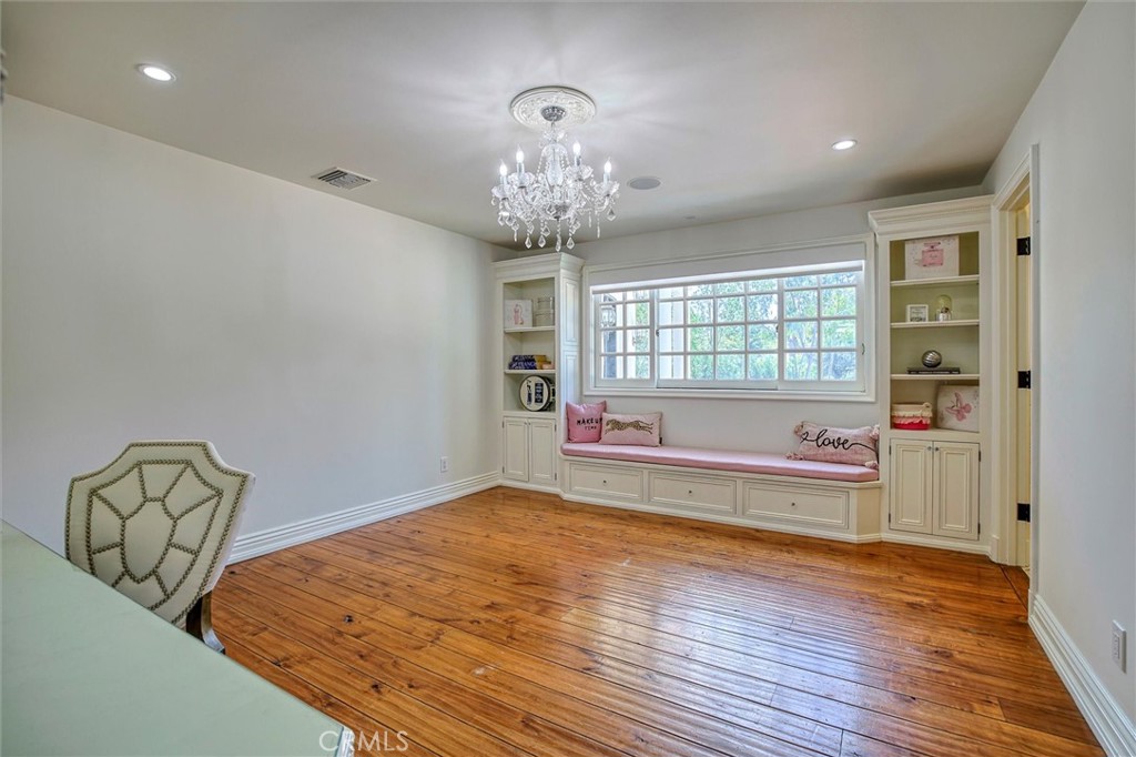 5839 Jed Smith Road Hidden Hills, CA 91302 - Photo 26 of 46 a view of a room with large windows