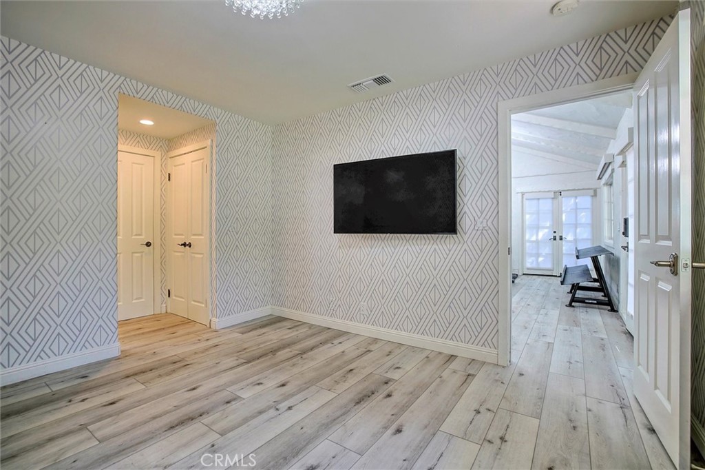 5839 Jed Smith Road Hidden Hills, CA 91302 - Photo 36 of 46 a view of a livingroom with wooden floor