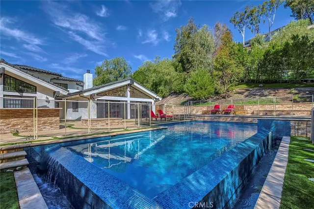 a view of a park with a large tree
