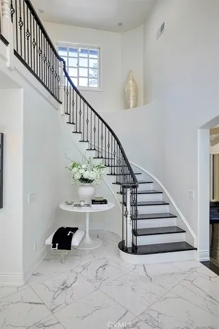 a view of livingroom with furniture and stairs